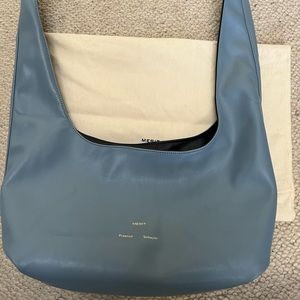 Merit x Proenza Schouler make up bag.